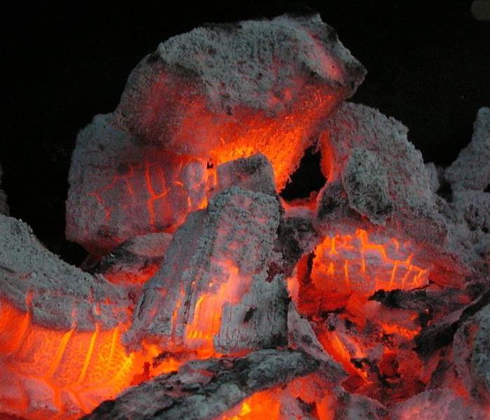 Hot coals burning in a fire