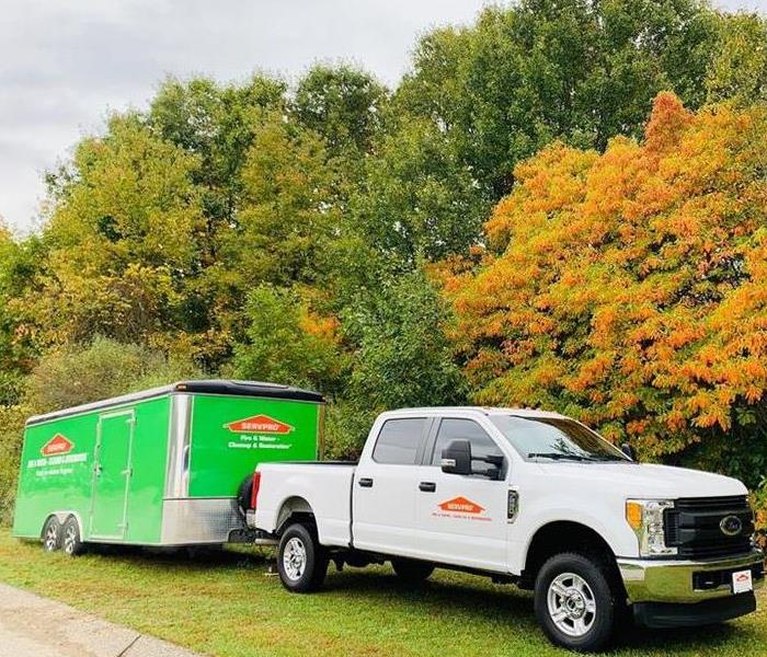 White SERVPRO truck pull storm trailer